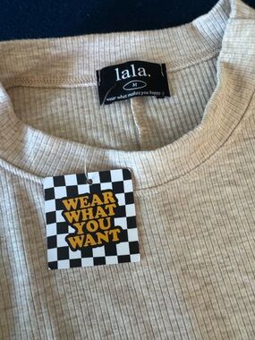 Dressed in LALA Ribbed Cream Tshirt dress! Travels great Go in style😊